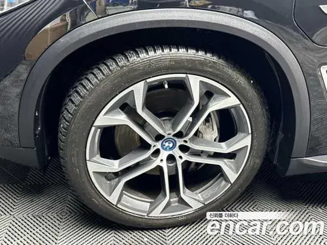 BMW X5 2022 — Фото 18/19
