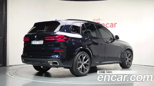 BMW X5 2023 — ფოტო 21/32