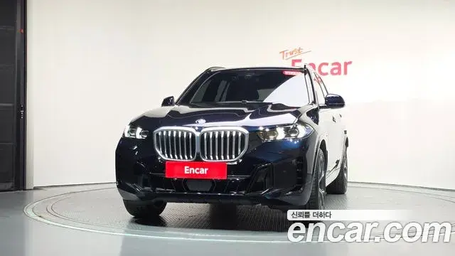BMW X5 2023 — ფოტო 29/32