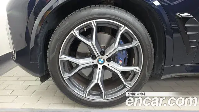 BMW X5 2023 — ფოტო 30/32