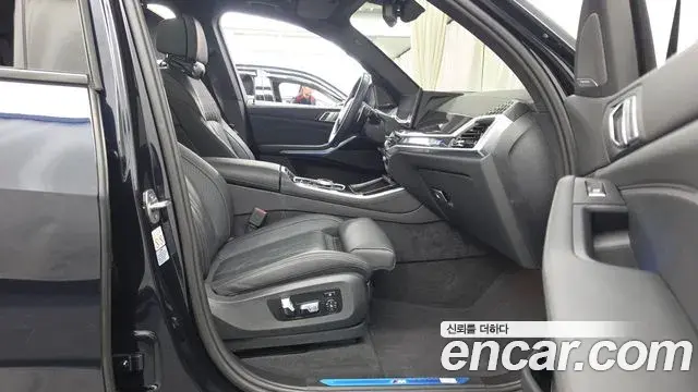 BMW X5 2023 — ფოტო 17/32