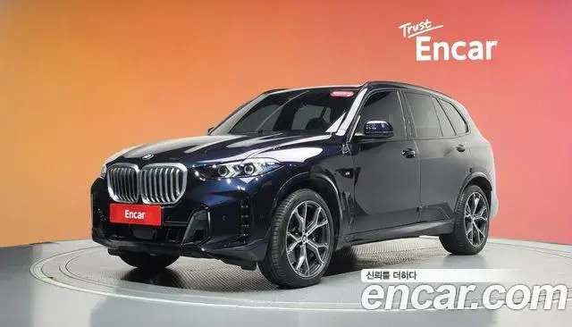 BMW X5 2023 — ფოტო 13/32
