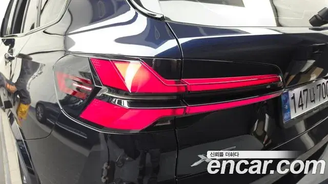 BMW X5 2023 — ფოტო 15/32