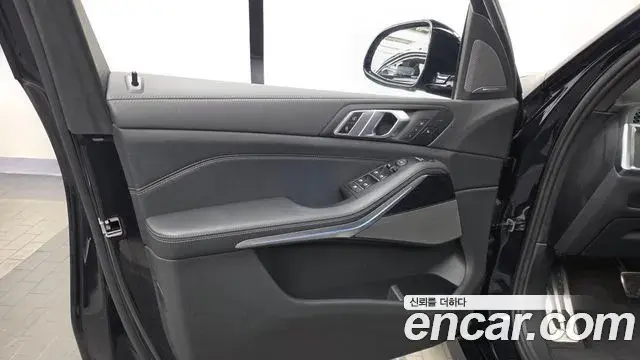 BMW X5 2023 — ფოტო 14/32