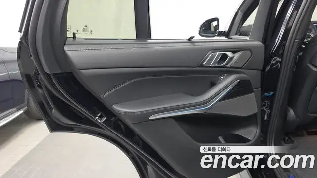 BMW X5 2023 — ფოტო 18/32