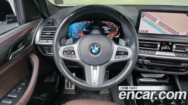 BMW X3 2022 — ფოტო 19/32