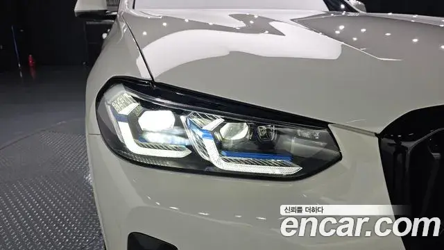 BMW X3 2022 — ფოტო 1/32
