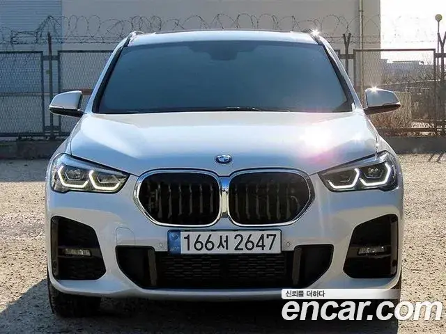 BMW X1 2021 — Фото 1/20