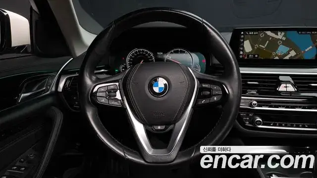 BMW 5 Series 2018 — Фото 13/20