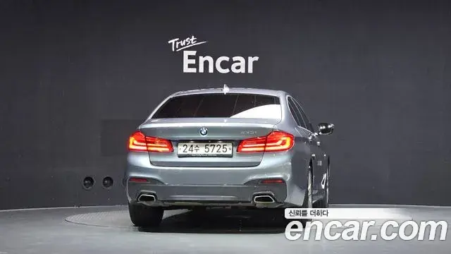 BMW 5 Series 2018 — Фото 4/20