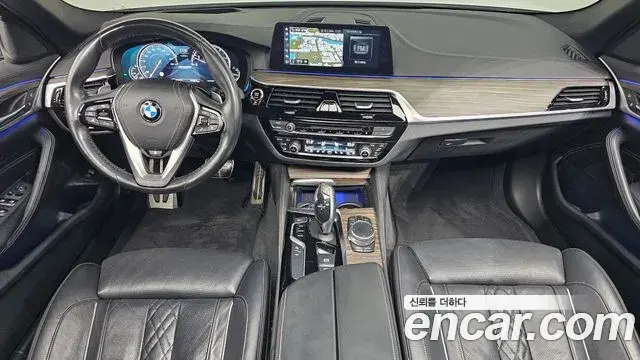 BMW 5 Series 2018 — Фото 7/20