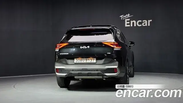 Kia Sportage 2022 — ფოტო 11/32
