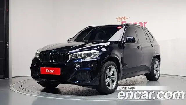 BMW X5 2018 — Фото 1/20