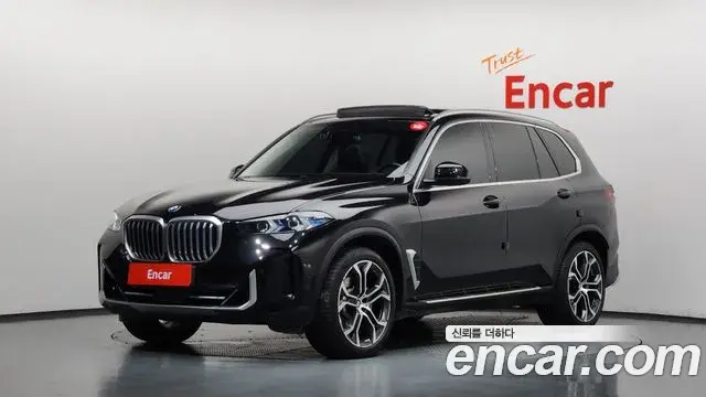 BMW X5 2023 — Фото 1/20