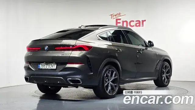 BMW X6 2021 — Фото 2/20