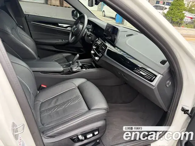 BMW 5 Series 2023 — Фото 17/20