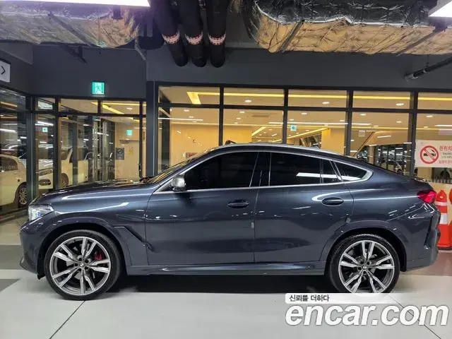 BMW X6 2022 — Фото 2/20