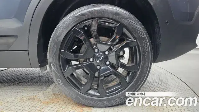 Kia Seltos 2023 — ფოტო 1/30