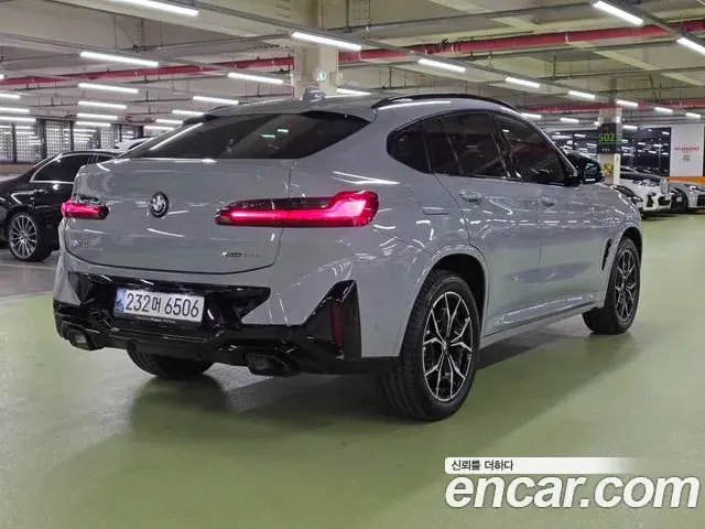 BMW X4 2024 — Фото 4/20