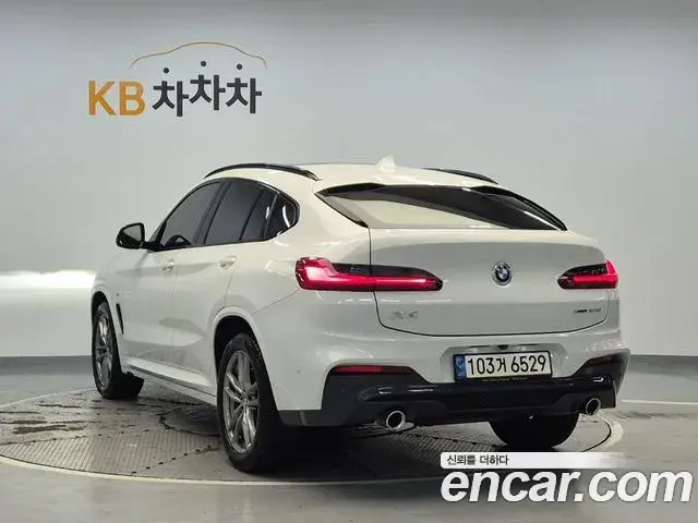 BMW X4 2021 — Фото 2/19