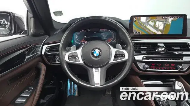 BMW 5 Series 2023 — Фото 12/20