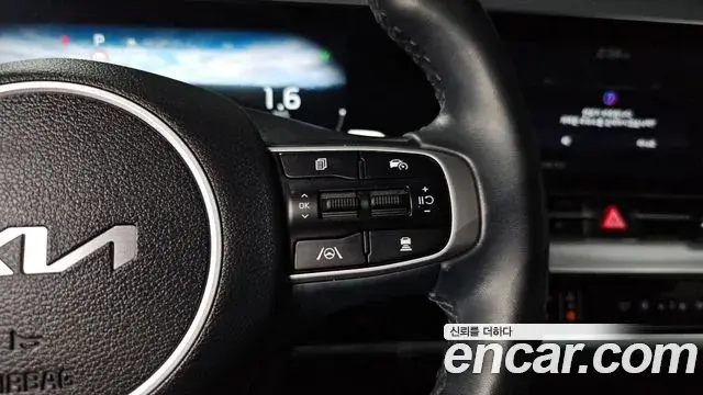Kia Sportage 2023 — ფოტო 25/34