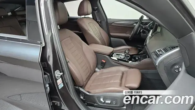 BMW X4 2023 — Фото 12/20
