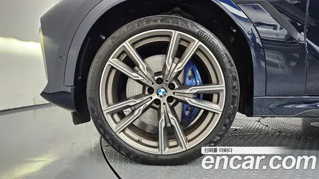 BMW X6 2021 — Фото 4/20
