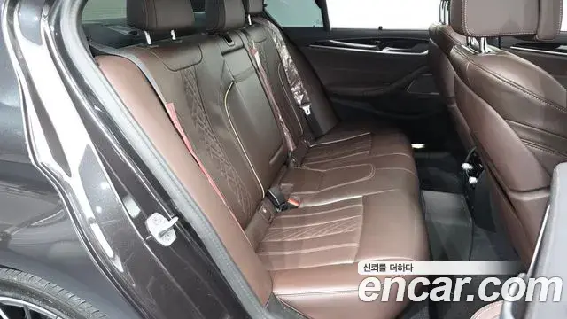 BMW 5 Series 2023 — Фото 12/20