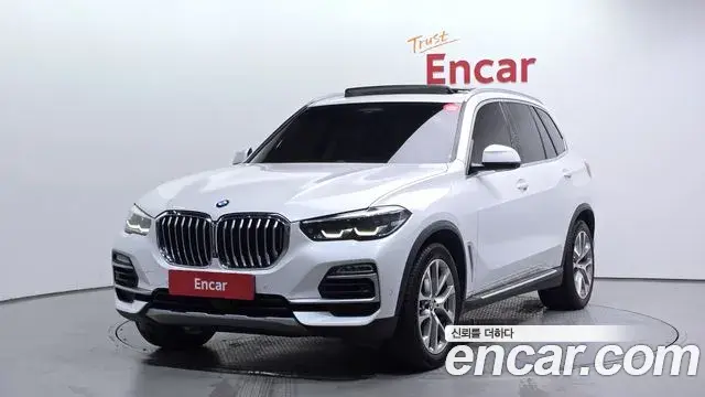 BMW X5 2021 — Фото 1/20