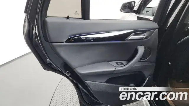 BMW X1 2022 — ფოტო 19/32