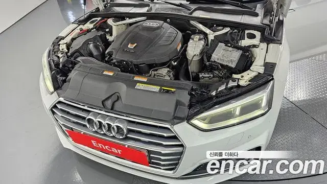 Audi A5 2019 — ფოტო 28/32
