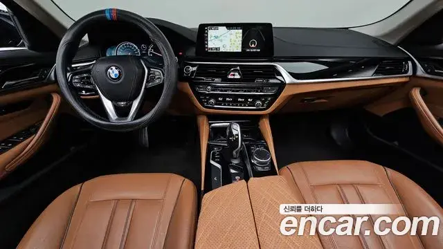 BMW 5 Series 2018 — Фото 7/20