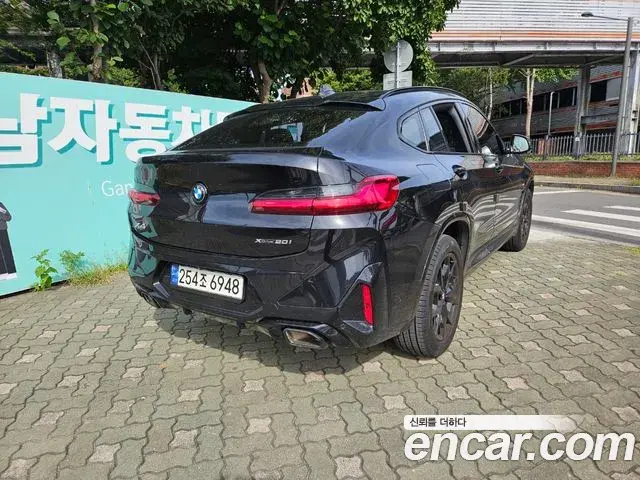 BMW X4 2022 — Фото 2/20