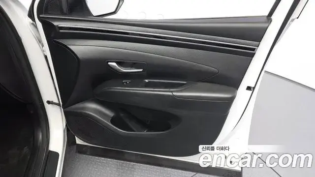 Hyundai Tucson Hybrid 2023 — ფოტო 1/30