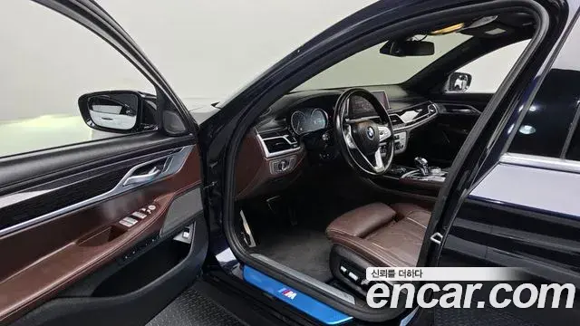 BMW 7 Series 2019 — Фото 10/20