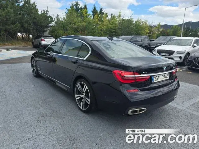 BMW 7 Series 2018 — Фото 6/19
