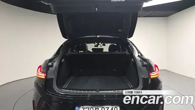 BMW X4 2024 — ფოტო 25/35