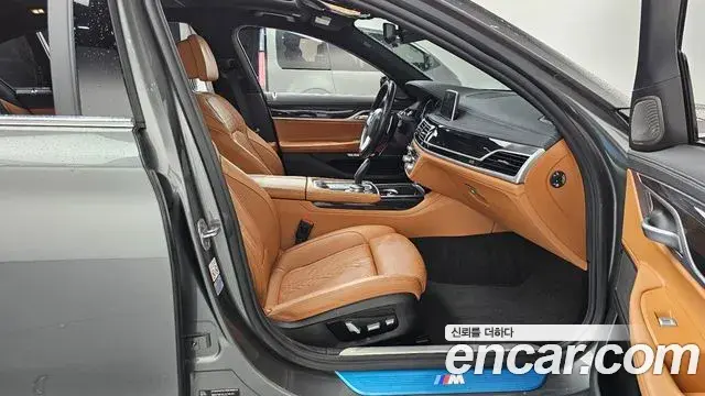 BMW 7 Series 2018 — Фото 11/20
