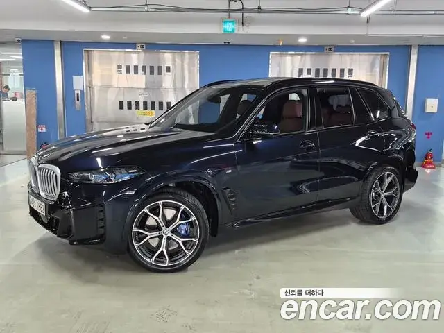 BMW X5 2024 — Фото 1/20