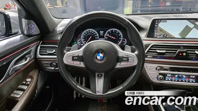 BMW 7 Series 2018 — Фото 12/20