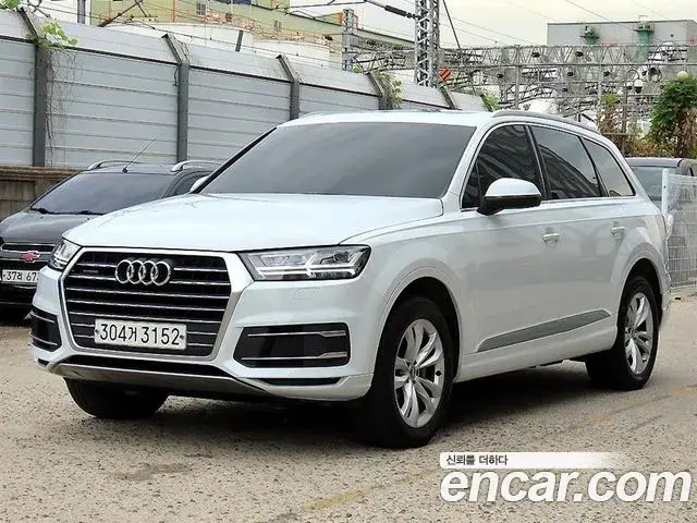 Audi Q7 2019 — Фото 1/20