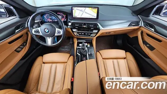 BMW 5 Series 2023 — Фото 7/20