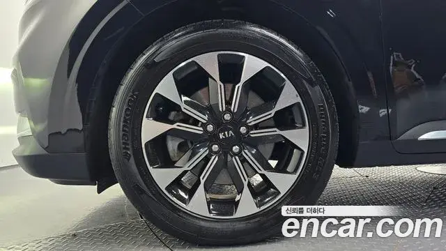 Kia Carnival 2021 — ფოტო 6/31
