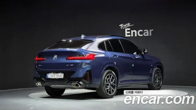BMW X4 2023 — Фото 2/20