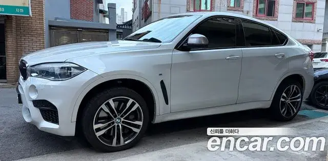 BMW X6 2018 — Фото 2/10