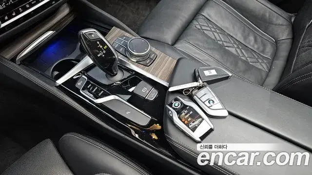 BMW 5 Series 2018 — Фото 7/20