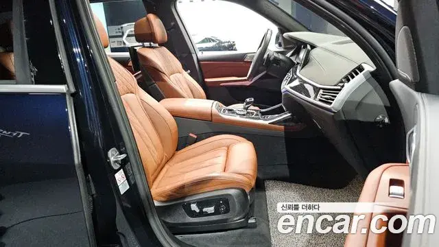BMW X7 2022 — Фото 12/20