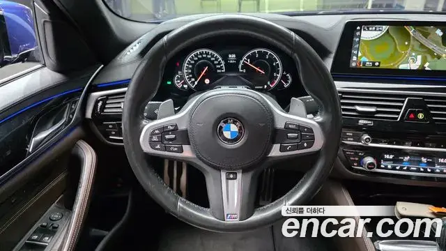 BMW 5 Series 2018 — Фото 13/20