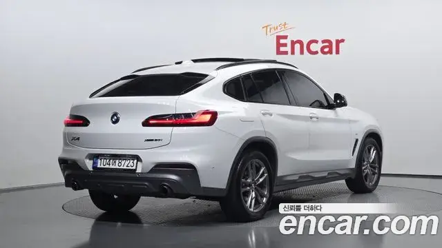 BMW X4 2021 — Фото 2/20